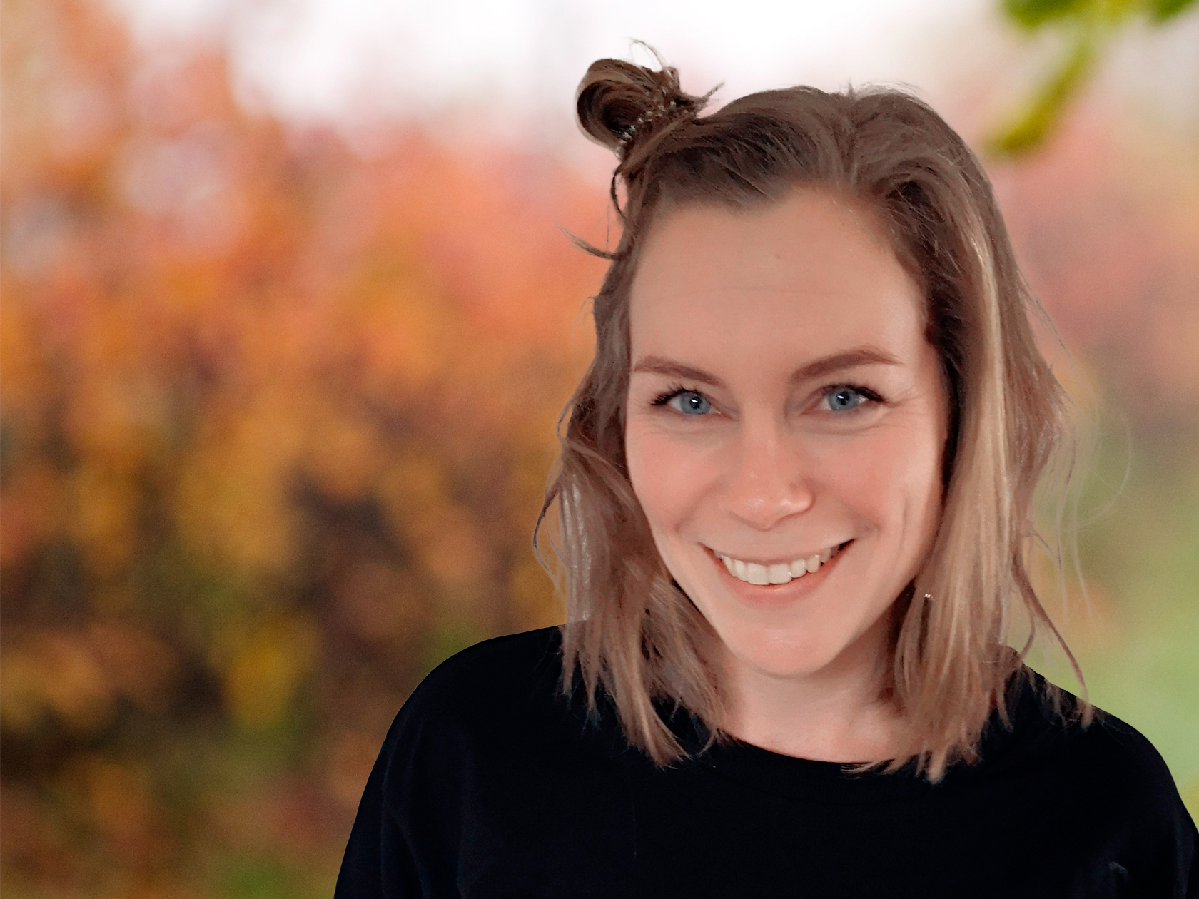 Förskollärare som ler 